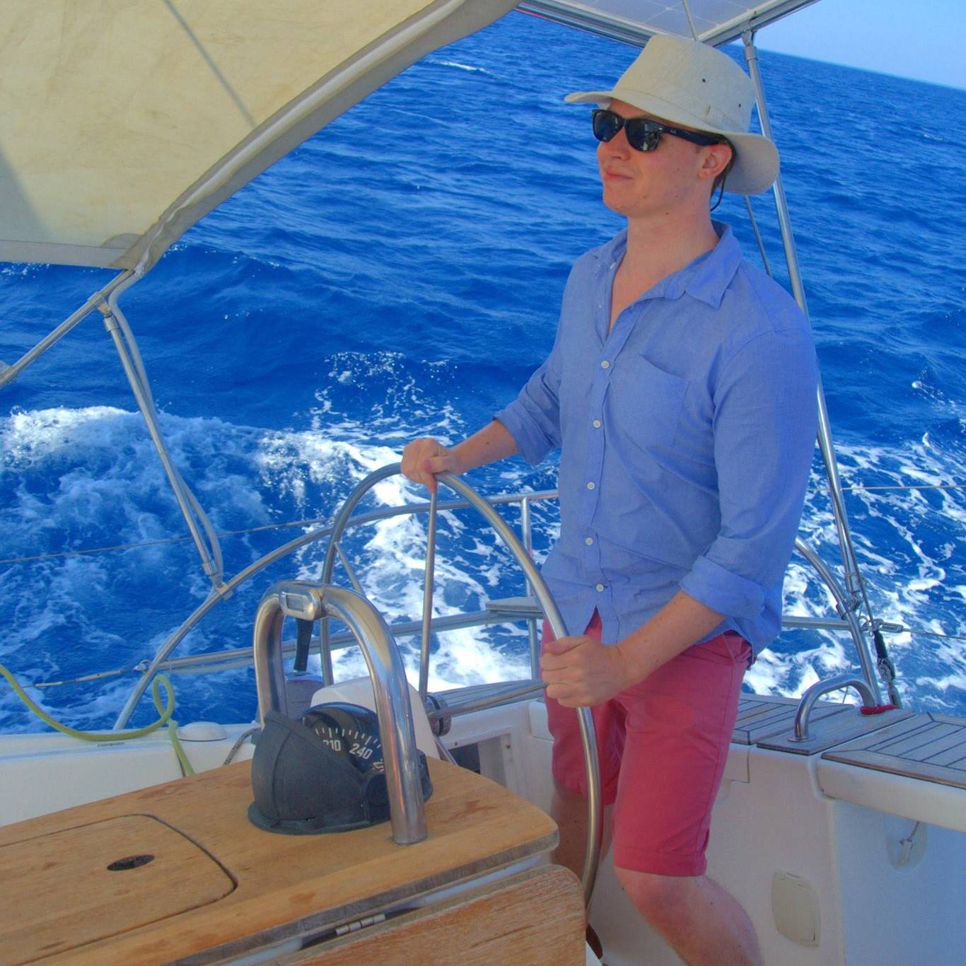 Photograph of Richard sailing somewhere sunny